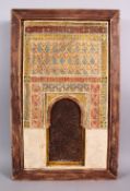 A 19TH CENTURY ISLAMIC SPANISH ALHAMBRA POTTERY PLAQUE, in a wooden frame, 55cm high x 34cm wide.