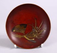 A JAPANESE MEIJI PERIOD GOLD & RED LACQUER DISH, decorated with scenes of a fan and lotus, base