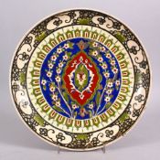A JAPANESE MEIJI PERIOD SATSUMA CERAMIC PLATE FOR THE ISLAMIC MARKET, decorated with iznik floral