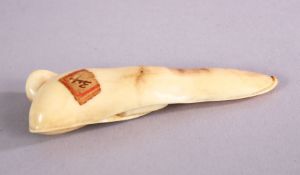 A JAPANESE MEIJI PERIOD CARVED IVORY NETSUKE OF BEANS - artist signed, old collectors label, 8cm.
