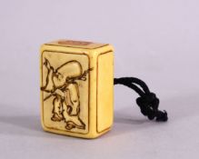 A JAPANESE MEIJI PERIOD CARVED NETSUKE - FUKUROKUJU - a rectangular box formed netsuke with carved
