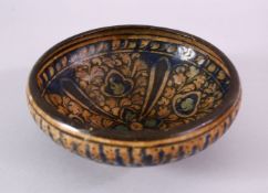 AN EARLY PERSIAN SULTAN ABBAD POTTERY BOWL, with floral motif decoration, 18cm.