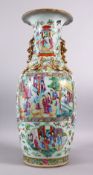 A LARGE 19TH CENTURY CHINESE FAMILLE ROSE CANTON PORCELAIN VASE, decorated with panels of figures in