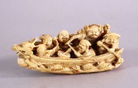 A LARGER JAPANESE MEIJI PERIOD CARVED IVORY NETSUKE - LUCKY GODS - TAKARABUNE- the ship carved