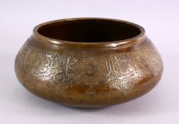 A 19TH CENTURY OR EARLIER ISLAMIC SILVER INLAID BRONZE / BRASS BOWL, with inlaid bands of