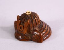 A JAPANESE MEIJI PERIOD CARVED BOXWOOD & IVORY KABUTO - carved with its himotoshi to the base, ivory
