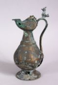 A 12TH CENTURY ISLAMIC PERSIAN BRONZE JUG, 15cm high .
