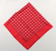 A GUCCI RED SILK SCARF, 34ins x 34ins.