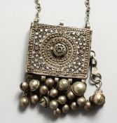 AN ISLAMIC SILVER NECKLACE with rectangular box. 6cms x 5cms.