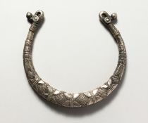 A HEAVY ISLAMIC CHOKER. 14cms wide.