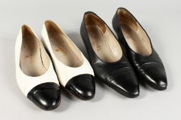 A PAIR OF CHANEL, SIZE 40, BLACK LEATHER SHOES and A PAIR OF TWO-COLOUR SHOES.
