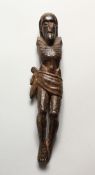 AN EARLY CARVED WOOD FIGURE OF CHRIST (lacking arms). 9ins high.