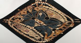 A HERMES BLACK AND GOLD SOIE PLISSE SCARF.