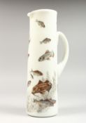 AN OPAQUE GLASS TAPERING JUG painted with fish. 12ins high.