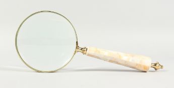 A MAGNIFYING GLASS WITH MOTHER-OF-PEARL HANDLE.