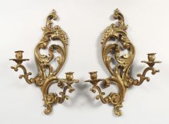 A PAIR OF BRONZE WALL SCONCES.