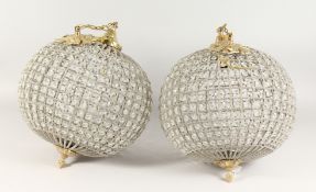 A SMALL PAIR OF CRYSTAL BALL LIGHTS. 13ins diameter.
