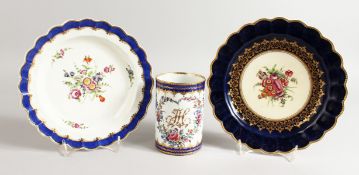 A WORCESTER BEAUTIFUL MUG fine painted with flowers and having the initials HC and two Worcester