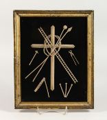 A FINE DECOUPAGE PICTURE late 19th century, depicting a crucifix and other symbols framed and