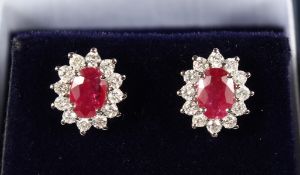 A PAIR OF 18CT WHITE GOLD, RUBY AND DIAMOND EARRINGS of 2.3cts.