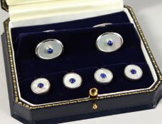 A GENTLEMAN'S SILVER, MOTHER-OF-PEARL AND LAPIS DRESS STUD AND CUFFLINKS.