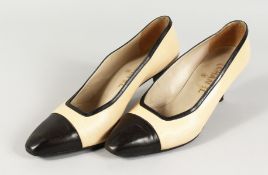 A PAIR OF CHANEL, SIZE 40, TWO-COLOUR LEATHER SHOES.