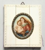 A MADONNA AND CHILD FRAMED MINIATURE. 3.5ins x 2.75ins.