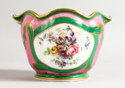 A SUPERB PARIS PORCELAIN CACHE POT painted with birds in a landscape under a pink and dark green