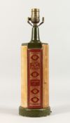 A LEATHER LAMP as spines of books. 16ins high.