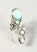 A SILVER AND REAL OPAL NATURALISTIC RING.
