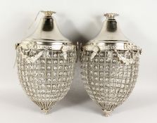 A LARGE PAIR OF PINEAPPLE SHAPED CRYSTAL LIGHTS. 22ins long.