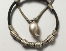 TWO ISLAMIC SILVER METAL NECKLACES.