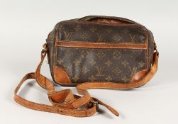A LOUIS VUITTON LEATHER BAG, in original box.