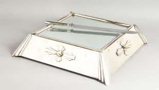 A SILVER PLATED ART DECO DESIGN MIRRORED CAKE STAND, with later storage box. Stand: 19ins x 19ins.