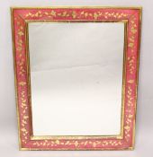 A RECTANGULAR WALL MIRROR, with red painted and gilt decorated frame. 3ft 2ins x 2ft 7ins.