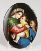 A GOOD DRESDEN OVAL PLAQUE, Madonna and Child. 7ins x 5ins.