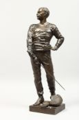 LUCA MADRASSI (1848-1919) ITALIAN THE FENCER. A GOOD BRONZE OF A MAN holding a foil, face guard