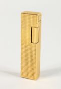 A COLIBIRI GILT METAL CIGARETTE LIGHTER.
