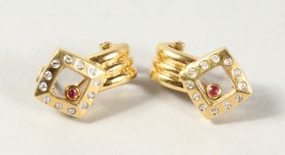 A PAIR OF 18CT YELLOW GOLD CHOPARD STYLE DANCING RUBY AND DIAMOND EARRINGS.