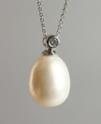 A SUPERB 18CT WHITE GOLD, PEARL AND DIAMOND PENDANT on chain.