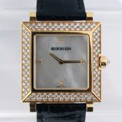 A BOUCHERON GENTLEMAN'S 18CT GOLD WRISTWATCH, with a mother-of-pearl square shaped dial, diamond
