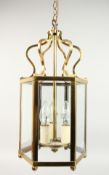 A BRASS OCTAGONAL HANGING LANTERN.