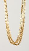 A CHANEL GOLD PLATED PEARL CC LONG CHAIN NECKLACE, in Chanel box.