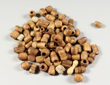 A QUANTITY OF CARVED BONE BEADS, possibly Egyptian/Coptic.