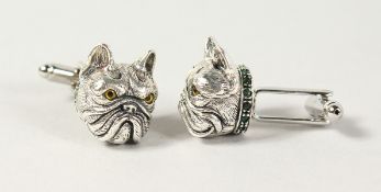 A PAIR OF SILVER AND EMERALD SET FRENCH BULLDOG CUFFLINKS.