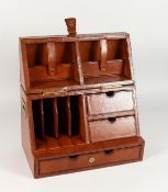 A GOOD FOLDING LEATHER FITTED STATIONERY BOX. 15ins wide.