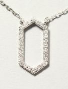 AN 18CT WHITE GOLD SIX SIDED DIAMOND PENDANT NECKLACE in the Art Deco style.
