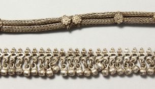 TWO ISLAMIC SILVER METAL BRACELETS.
