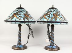 A GOOD PAIR OF DRAGONFLY LAMPS in the Tiffany style.