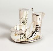 A SILVER PLATED HORSE RIDING CRUET.